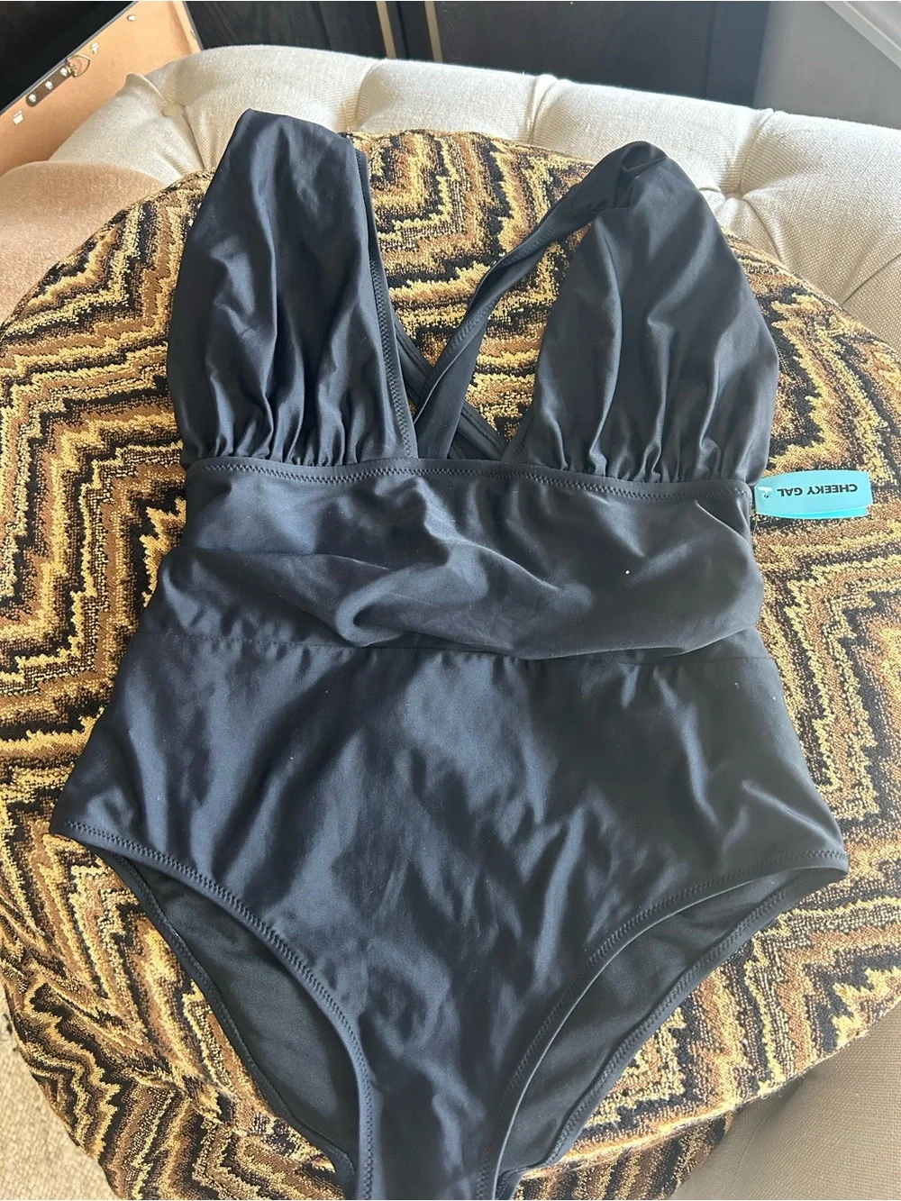 Sleek Black One-Piece Swimsuit with Tummy Ruching